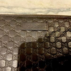 Gucci wallet in brown. 7 out of 10 condition